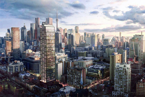 Two people in yellow life jackets paddling a green kayak on a lake surrounded by trees.